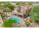 Stunning home with a backyard oasis, pool, outdoor kitchen, and desert landscaping at 4727 E Rancho Caliente Dr, Cave Creek, AZ 85331