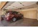 Clean and organized garage with epoxy flooring and built-in storage cabinets, ready for vehicles and projects at 4727 E Rancho Caliente Dr, Cave Creek, AZ 85331