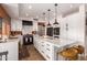 Modern kitchen with stainless steel appliances, white cabinetry, and quartz countertops at 4727 E Rancho Caliente Dr, Cave Creek, AZ 85331