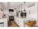 Well-designed kitchen with a central island, pendant lighting, and modern appliances at 4727 E Rancho Caliente Dr, Cave Creek, AZ 85331