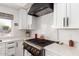 Modern kitchen featuring sleek appliances, stylish backsplash and stone countertops at 4727 E Rancho Caliente Dr, Cave Creek, AZ 85331