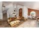 Open-concept living room featuring tile floors, high ceilings, and staircase access at 4727 E Rancho Caliente Dr, Cave Creek, AZ 85331