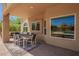 Inviting covered patio featuring an outdoor dining area, perfect for enjoying meals al fresco at 4727 E Rancho Caliente Dr, Cave Creek, AZ 85331