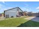 Spacious backyard with lush artificial grass, patio, and privacy wall, perfect for outdoor enjoyment at 4732 S 38Th Gln, Phoenix, AZ 85041