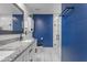 Updated bathroom featuring a large shower, granite countertop, and modern finishes at 4732 S 38Th Gln, Phoenix, AZ 85041