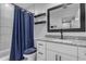 Beautiful bathroom with granite countertops, a stylish vanity, and tiled floors at 4732 S 38Th Gln, Phoenix, AZ 85041