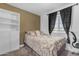 Cozy bedroom with natural light and neutral tones at 4732 S 38Th Gln, Phoenix, AZ 85041