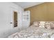 Comfortable bedroom with a mirrored closet door and charming decor at 4732 S 38Th Gln, Phoenix, AZ 85041