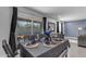 Bright dining area with black curtains and a view of the backyard through sliding glass doors at 4732 S 38Th Gln, Phoenix, AZ 85041