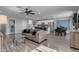 Open concept living space, seamlessly integrating the living room, kitchen, and dining areas at 4732 S 38Th Gln, Phoenix, AZ 85041