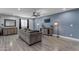 Cozy living area featuring modern furniture, neutral walls, and plenty of space for entertaining at 4732 S 38Th Gln, Phoenix, AZ 85041