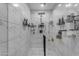 Spacious, modern shower with marble tile and sleek fixtures at 4732 S 38Th Gln, Phoenix, AZ 85041