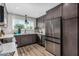Well-lit kitchen featuring sleek cabinetry, stainless steel appliances, and modern countertops at 4950 N 78Th St, Scottsdale, AZ 85251