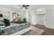 Bright main bedroom featuring closet, ceiling fan, and sliding glass doors, creating a peaceful retreat at 4950 N 78Th St, Scottsdale, AZ 85251