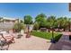 Expansive backyard with gravel and grass areas and ample outdoor seating at 51 N Rush St, Chandler, AZ 85226