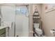 Bathroom featuring a walk in shower and toilet at 51 N Rush St, Chandler, AZ 85226