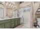 Bathroom features a double sink vanity with walk in shower at 51 N Rush St, Chandler, AZ 85226