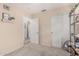 Neutral bedroom with carpet flooring and door to other room and closet at 51 N Rush St, Chandler, AZ 85226