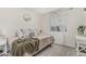 Comfortable secondary bedroom with large window and plush carpet at 51 N Rush St, Chandler, AZ 85226