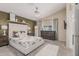 Spacious main bedroom with a patterned accent wall, and an ensuite bathroom at 51 N Rush St, Chandler, AZ 85226