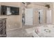 View of the main bedroom leading into the ensuite bathroom and walk in closet at 51 N Rush St, Chandler, AZ 85226