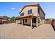 Back of home featuring a patio and brick-paved yard, perfect for outdoor entertaining at 5401 N 104Th Dr, Glendale, AZ 85307