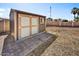 Backyard featuring large shed on a brick foundation at 5401 N 104Th Dr, Glendale, AZ 85307