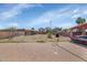 Backyard features a brick patio, storage shed, and room for outdoor activities at 5401 N 104Th Dr, Glendale, AZ 85307