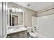 Clean bathroom featuring a modern vanity with a sink and a shower-tub combo at 5401 N 104Th Dr, Glendale, AZ 85307