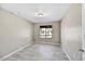 Bedroom featuring natural light, tile flooring, and neutral walls at 5401 N 104Th Dr, Glendale, AZ 85307