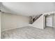 Spacious living room with tile flooring and stairs leading to the second floor at 5401 N 104Th Dr, Glendale, AZ 85307