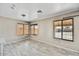 Bright room with tile flooring, neutral walls, and large windows at 5401 N 104Th Dr, Glendale, AZ 85307