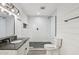 Beautiful bathroom features a tiled shower, updated fixtures, and modern design elements at 5614 N 20Th Dr, Phoenix, AZ 85015