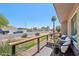 Inviting front porch with cozy seating area, perfect for relaxing outdoors with a view of the desert landscape at 5614 N 20Th Dr, Phoenix, AZ 85015