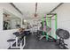 Well-equipped garage gym with weights, machines, and ample space for workouts at 5614 N 20Th Dr, Phoenix, AZ 85015