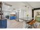 Bright kitchen with granite island, stainless steel appliances, and modern cabinetry at 5614 N 20Th Dr, Phoenix, AZ 85015