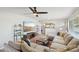 Cozy living room features a ceiling fan, recessed lighting, and shelving with plants at 5614 N 20Th Dr, Phoenix, AZ 85015