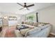 Comfortable living room with a spacious sectional sofa, large window, and stylish decor, perfect for relaxing at 5614 N 20Th Dr, Phoenix, AZ 85015