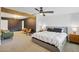 Spacious main bedroom features a king-size bed, stylish decor, and bright natural light at 5614 N 20Th Dr, Phoenix, AZ 85015