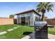 Backyard bonus room with grill, artificial turf and a grill in a modern backyard at 6802 E Oak St, Scottsdale, AZ 85257