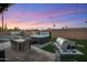 Backyard patio with a spa, grill, and dining area, perfect for outdoor gatherings at 6802 E Oak St, Scottsdale, AZ 85257