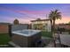 Backyard patio with spa, grill, turf and finished bonus room, perfect for entertaining at 6802 E Oak St, Scottsdale, AZ 85257