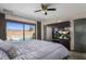 Bedroom with sliding glass doors to a pool featuring a unicorn float at 6802 E Oak St, Scottsdale, AZ 85257
