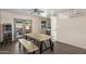 Dining room with tile flooring, ample light and arcade game in view at 6802 E Oak St, Scottsdale, AZ 85257