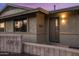 Close up of home's front entrance with modern door, desert landscaping and house number at 6802 E Oak St, Scottsdale, AZ 85257