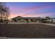 Charming single-story home with desert landscaping and attached carport at 6802 E Oak St, Scottsdale, AZ 85257
