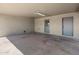 Spacious garage with neutral walls, and ample room for cars and storage solutions at 6802 E Oak St, Scottsdale, AZ 85257