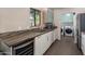 Open kitchen with view into the laundry area at 6802 E Oak St, Scottsdale, AZ 85257
