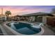 Backyard pool with patio and outdoor seating, showcasing the home's backyard entertaining space at 6802 E Oak St, Scottsdale, AZ 85257