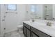 Bright bathroom with double sinks, a large mirror, and modern fixtures at 7261 E Teal Way, San Tan Valley, AZ 85143